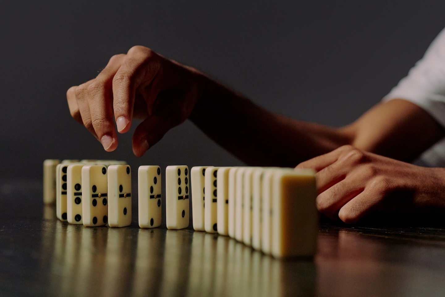 Domino tiles falling in a row